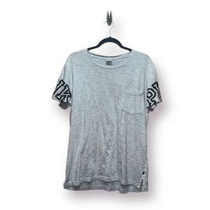 Pink cool tone gray (hints of baby blue) T-shirt. Size L